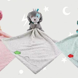 May include: Three plush security blankets for babies, each featuring a different animal: an elephant, a dog, and a horse. The blankets are soft and cuddly, with embroidered details.