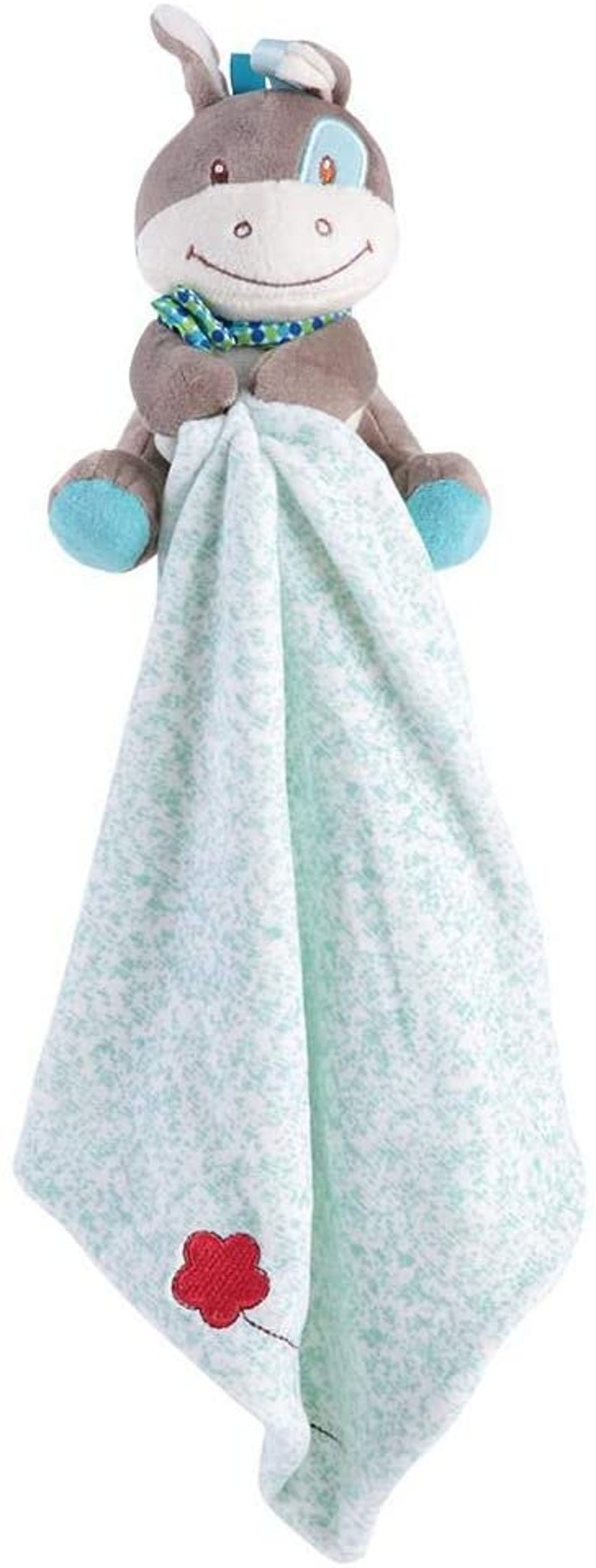 May include: A plush grey donkey toy with blue eyes and a green scarf is attached to a soft, light blue and white blanket with a red flower embroidered on it.