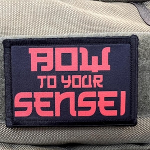 May include: Black patch with red text that reads "Bow to your Sensei".