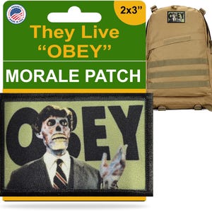 May include: A 2x3 inch morale patch featuring the image of a man with a skeletal face and the word "OBEY". The patch is black with a green background and a yellow border. The packaging reads "They Live" and "MORALE PATCH". A tan backpack is also in the image.