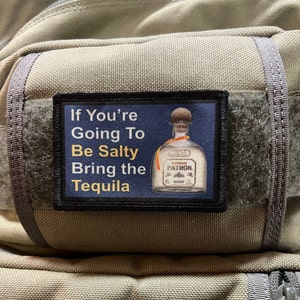 May include: A black and white patch with a blue background and the text "If You're Going To Be Salty Bring the Tequila" with a bottle of Patron tequila on the right side.