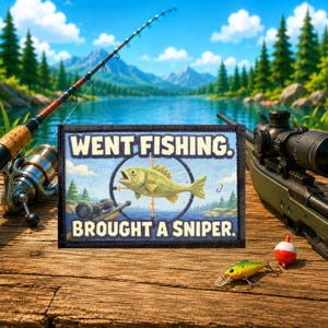 May include: A rectangular embroidered patch with a black border featuring a light blue background, a green fish centered in a black sniper scope reticle, and the white text WENT FISHING. BROUGHT A SNIPER. The design includes a small rifle graphic.