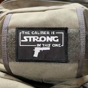 The Caliber is Strong in This One Morale Patch- Hook and loop Custom Patch 2x3" Made in the USA!