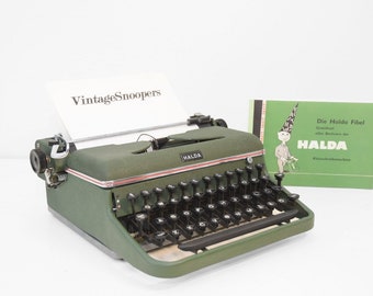 Halda Portable P typewriter with QWERTY keyboard, in mint condition with new ribbon.