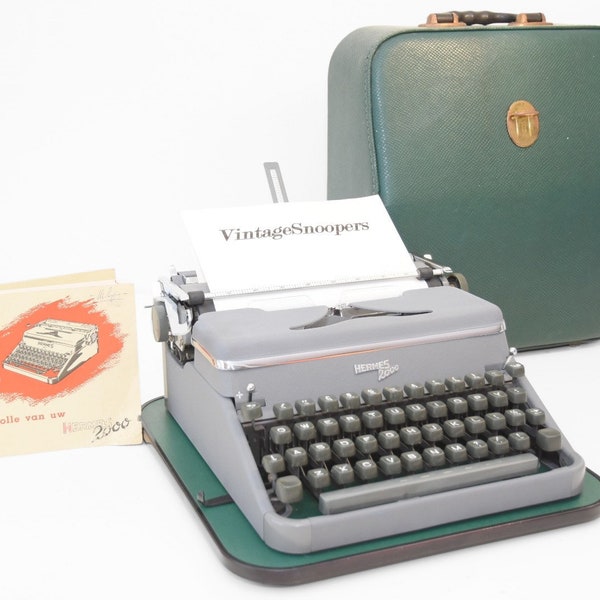 Hermes 2000 portable typewriter 60s  in excellent condition, including new ribbon.QWERTIJ keyboard