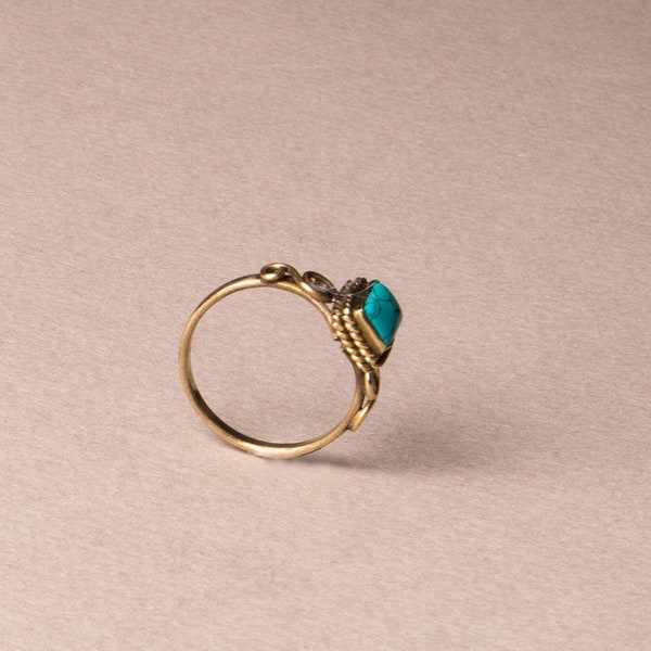 Square turquoise ring playfully handmade