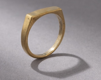 Simple bar signet ring made of brass