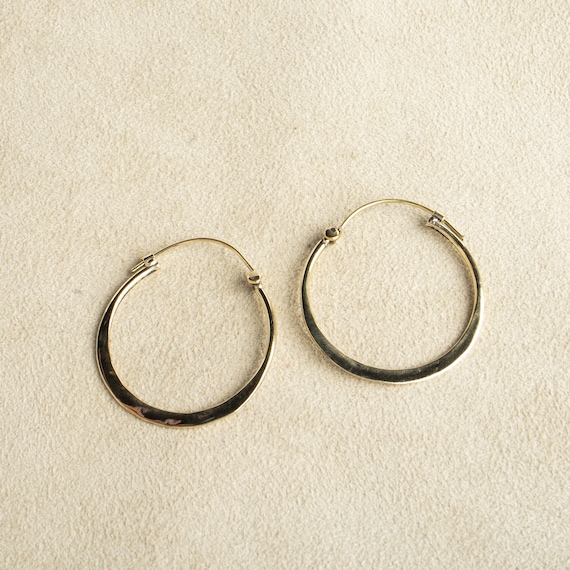 Asymmetrical 2024 hoop earrings