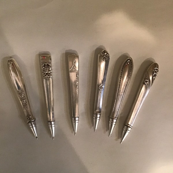 Silverplate flatware knife handle ball point pen.