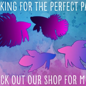 May include: A watercolour background in blue, purple, and pink, with four fish silhouettes in purple and pink. The text "LOOKING FOR THE PERFECT PAIR?" and "CHECK OUT OUR SHOP FOR MORE" are written in white.
