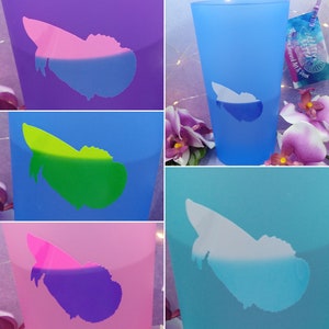May include: A selection of colour-changing vinyl cups. The cups change colour when cold, displaying a butterfly design. Text on the image reads "Color Changing Vinyl" and "Cold Activated".