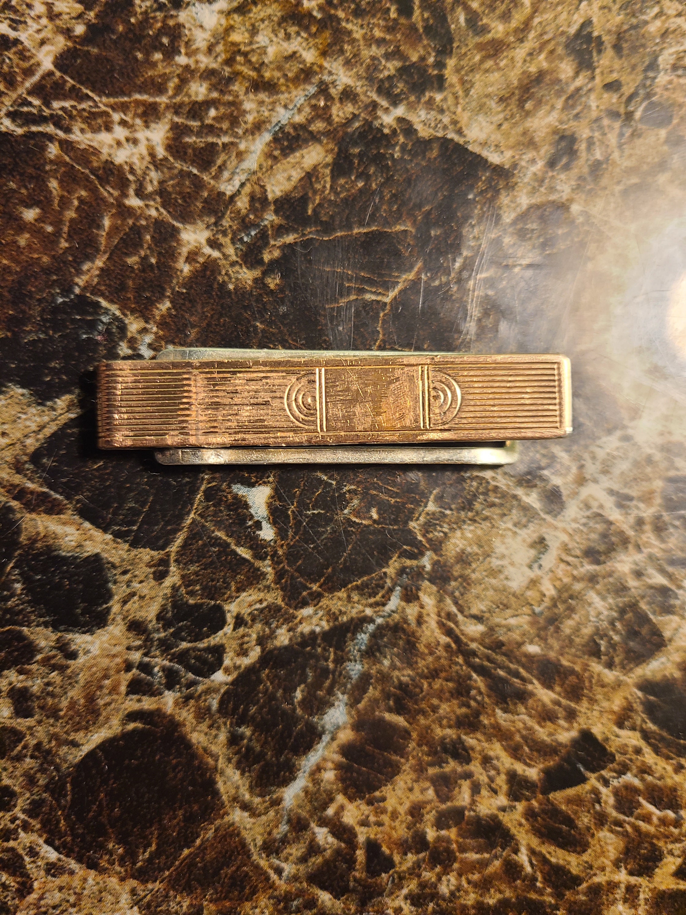 Sold at Auction: A CARTIER MONEY CLIP the rectangular body with ver