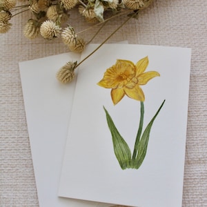 Carte de voeux jaune à imprimé jonquilles