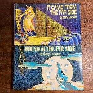 May include: Two paperback books by Gary Larson, "It Came From The Far Side" and "Hound of the Far Side". The covers feature black and white illustrations of cows in different settings.