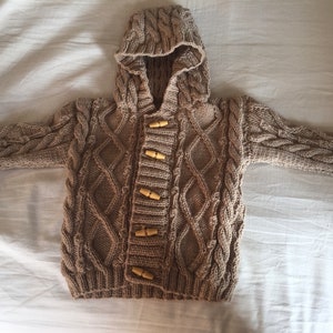 Hand knitted children’s hoodies ...various styles