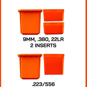 May include: Bright orange stackable inserts for storage. The image shows two sets of inserts, one for 9MM, .380, and 22LR, and another for .223/556. The text on the image reads "STACKABLE INSERTS".