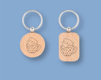 Llavero de gato personalizado con nombre, gatito en taza de corazones grabado en madera o piel