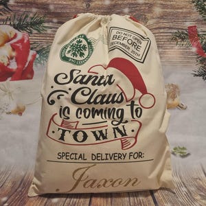 Personalised Christmas Santa Sack: Large Glitter Name Gift Bag Coming To Town