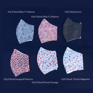 May include: Six fitted face masks with various patterns are displayed against a dark blue background. The patterns include blue U-shapes, pink U-shapes, solid grey, leopard print, floral orange, and floral magenta. Each mask has a white interior.