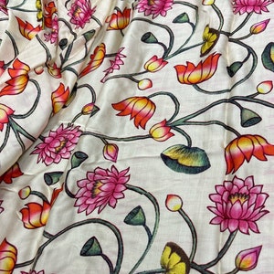 May include: White fabric with a repeating pattern of pink and orange lotus flowers with green stems and leaves.