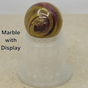 Glass Marble with Display - Game Marble lot 4866 out of round .64&quot; has cold roll twist