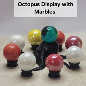 glass game 16mm marbles and octopus display see photos for imperfections - lot #4346