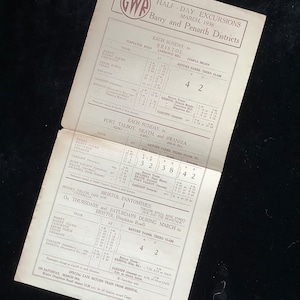 May include: A vintage Great Western Railway (GWR) timetable for half-day excursions in March 1938 from Barry and Penarth Districts to Bristol, Port Talbot, Neath, and Swansea. The timetable lists departure times and return fares for third class.