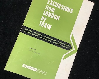 May include: A vintage brochure titled "Excursions from London by Train" with a green and white color scheme. The brochure lists train stations and the text "Winter until 15 April 1965". The British Rail logo is visible.