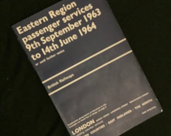 May include: A blue booklet titled "Eastern Region passenger services 9th September 1963 to 14th June 1964" with the text "British Railways" and "LONDON (including suburban areas) EASTERN COUNTIES EAST MIDLANDS THE NORTH" printed on the cover.