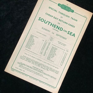 May include: A vintage British Railways train timetable for a special cheap day return train to Southend-on-Sea (Victoria) on Sunday, 1st September 1957. The timetable lists the departure and arrival times for various stations along the route, including Hertford (North), Cuffley, Bayford, Crews Hill, Enfield Chase, and Southend-on-Sea (Victoria).