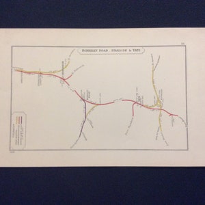 May include: A vintage map of the Berkeley Road, Standish & Yate railway lines. The map shows the different lines in red, yellow, and purple. The map is labelled with the names of the stations and towns along the lines.