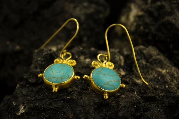 Puces d'oreilles turquoise