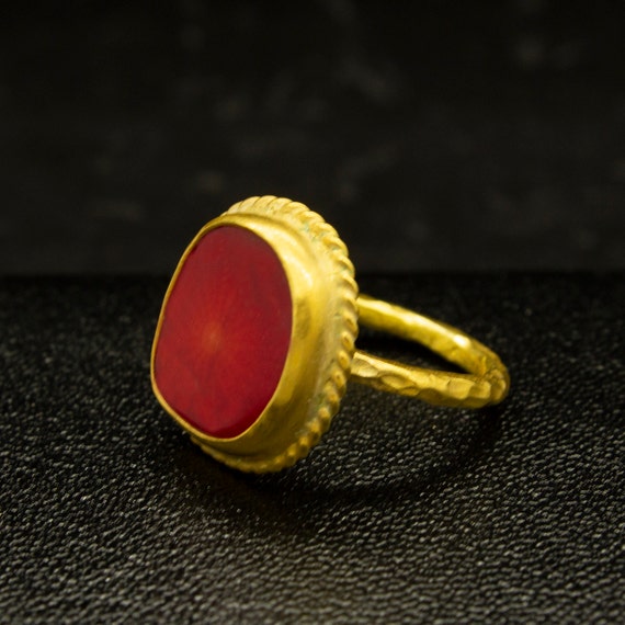 Fashionable red coral gemstone ring embedded with gold | Gold bridal  jewellery sets, Gold earrings designs, Gold ring designs
