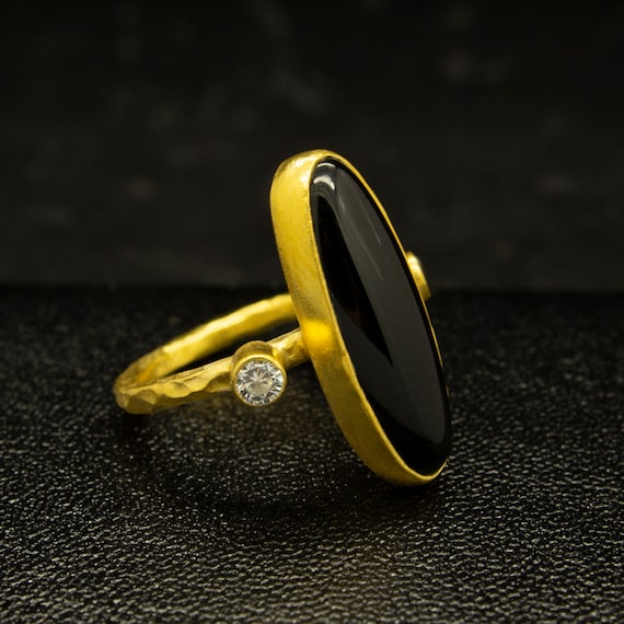 Black onyx ring gold deals