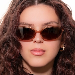 2000s PRADA 05E oval wrap sunglasses rose