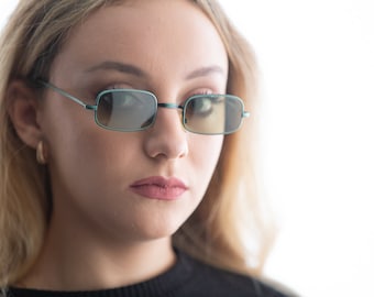 Vintage small sunglasses 2000s Versus Versace green narrow metal E64
