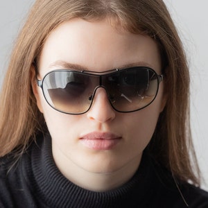 2000s MIU MIU SMU 54G shield sunglasses black metal