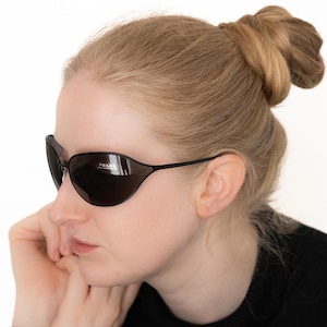 2000s PRADA 58E oval wrap sunglasses black metal