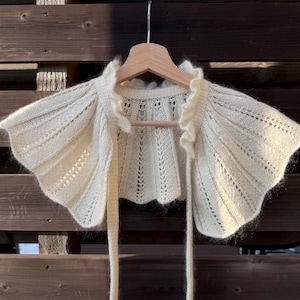 May include: A rustic wooden sign with the text "Welcome to our home" in white lettering. The sign has a distressed finish and a simple, inviting design, ideal for entryway decor.