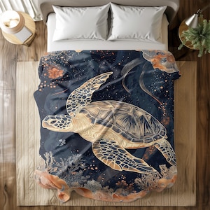 May include: A navy blue bedding set featuring a gold and white sea turtle design. The turtle is swimming in a coral reef against a starry night sky background.