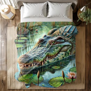 May include: A green alligator with sharp teeth is partially submerged in a swampy pond. The alligator's head and body are visible, with its eyes open and looking directly at the viewer. The water is clear and reflects the surrounding greenery. The alligator is surrounded by lily pads and other aquatic plants.