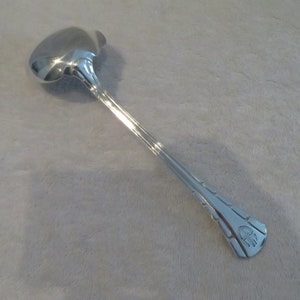 ladle with dessert silver metal goldsmith Ravinet Denfert st art deco papyrus French silver-plated dessert ladle