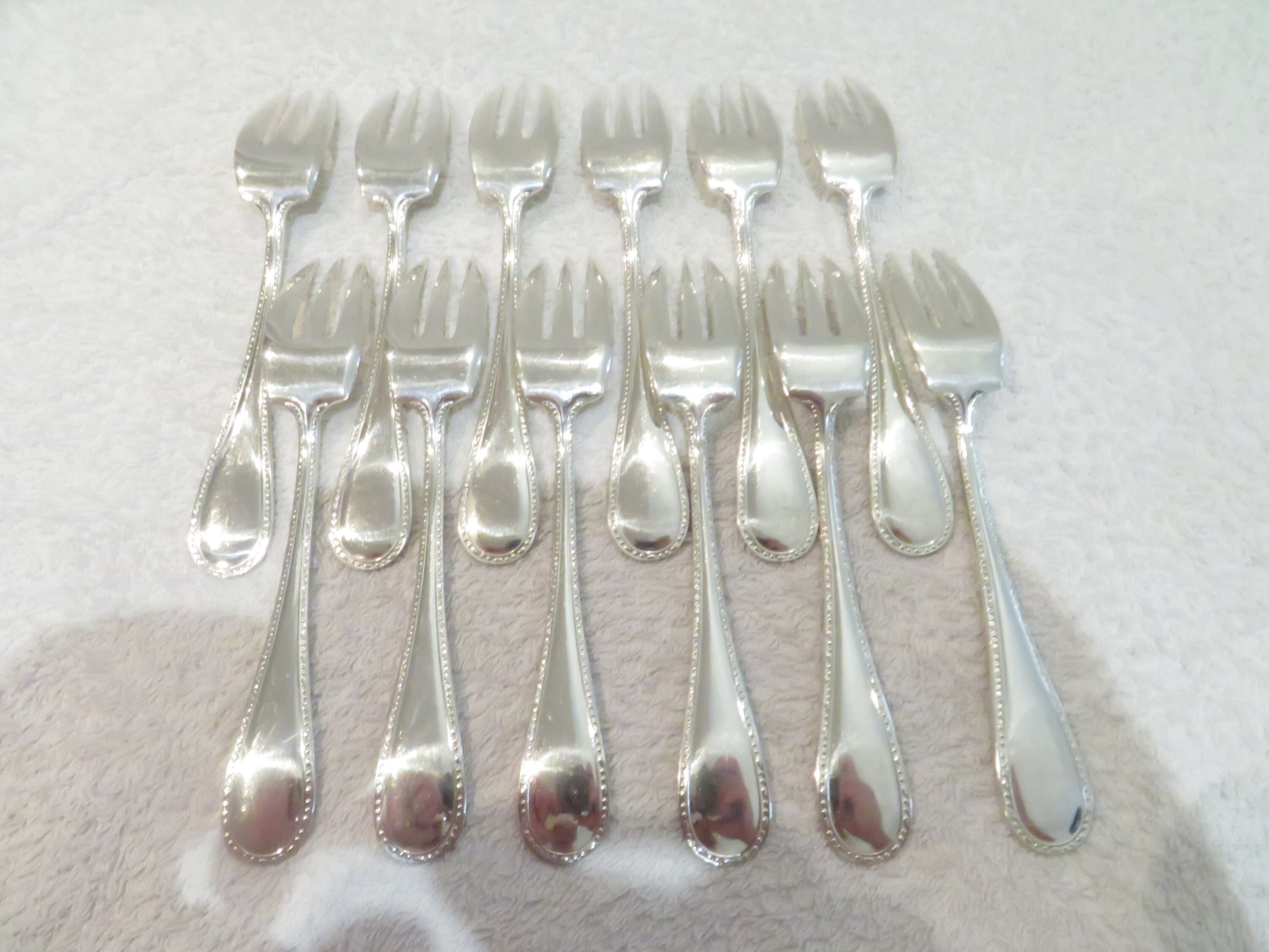 12 Fourchettes à Gâteau Od'a Métal Argenté - Modèle Perle - Occasion
