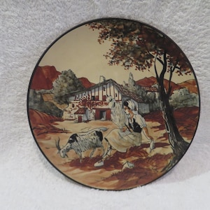 Beautiful stoneware plate from Ciboure decorated with Basque Shepherdess spinner Le Corrone Vintage French pottery plate d 25.1cm