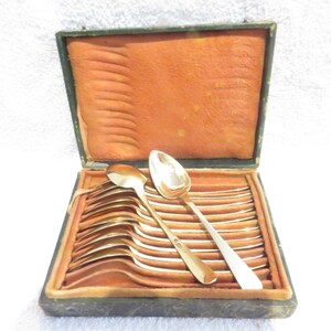 2 sets of 6 silver-gilt coffee spoons, 2nd rooster, Paris, Baguette pattern, 2 silversmiths, 1809-1819, French, 950
