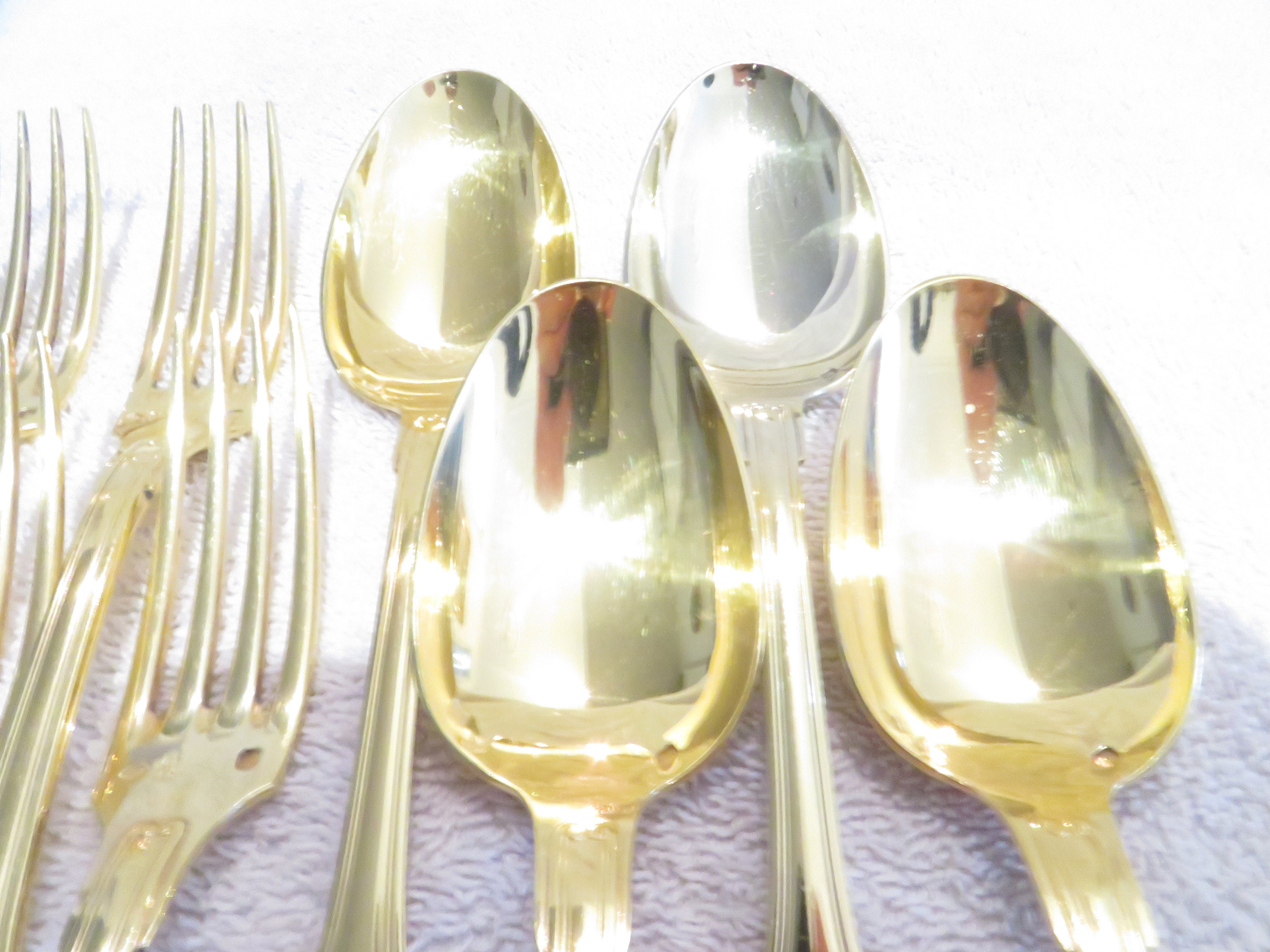 4 Silver-gilt Dessert Spoons and 4 Silver-vermeil Forks (950 Hallmark ...