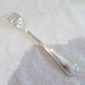 Stew fork to serve silver metal style Louis XVI goldsmith Christofle model French ribbons silver-plated serving fork