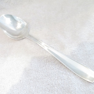 Stew or serving spoon silversmith Christofle model Atlas Mid 20th c silver-plated serving spoon 26.2cm