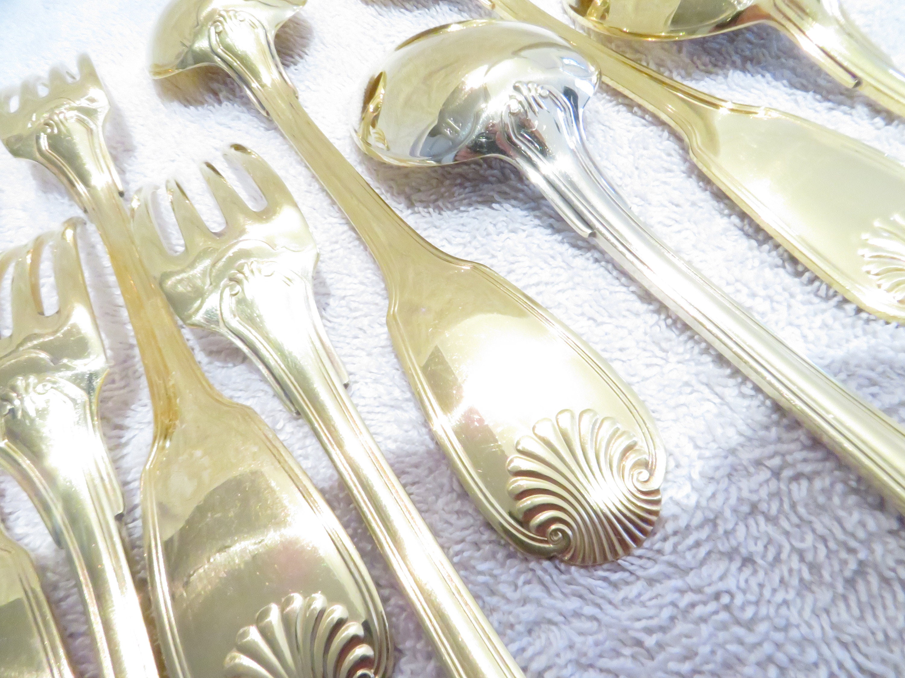 4 Silver-gilt Dessert Spoons and 4 Silver-vermeil Forks (950 Hallmark ...