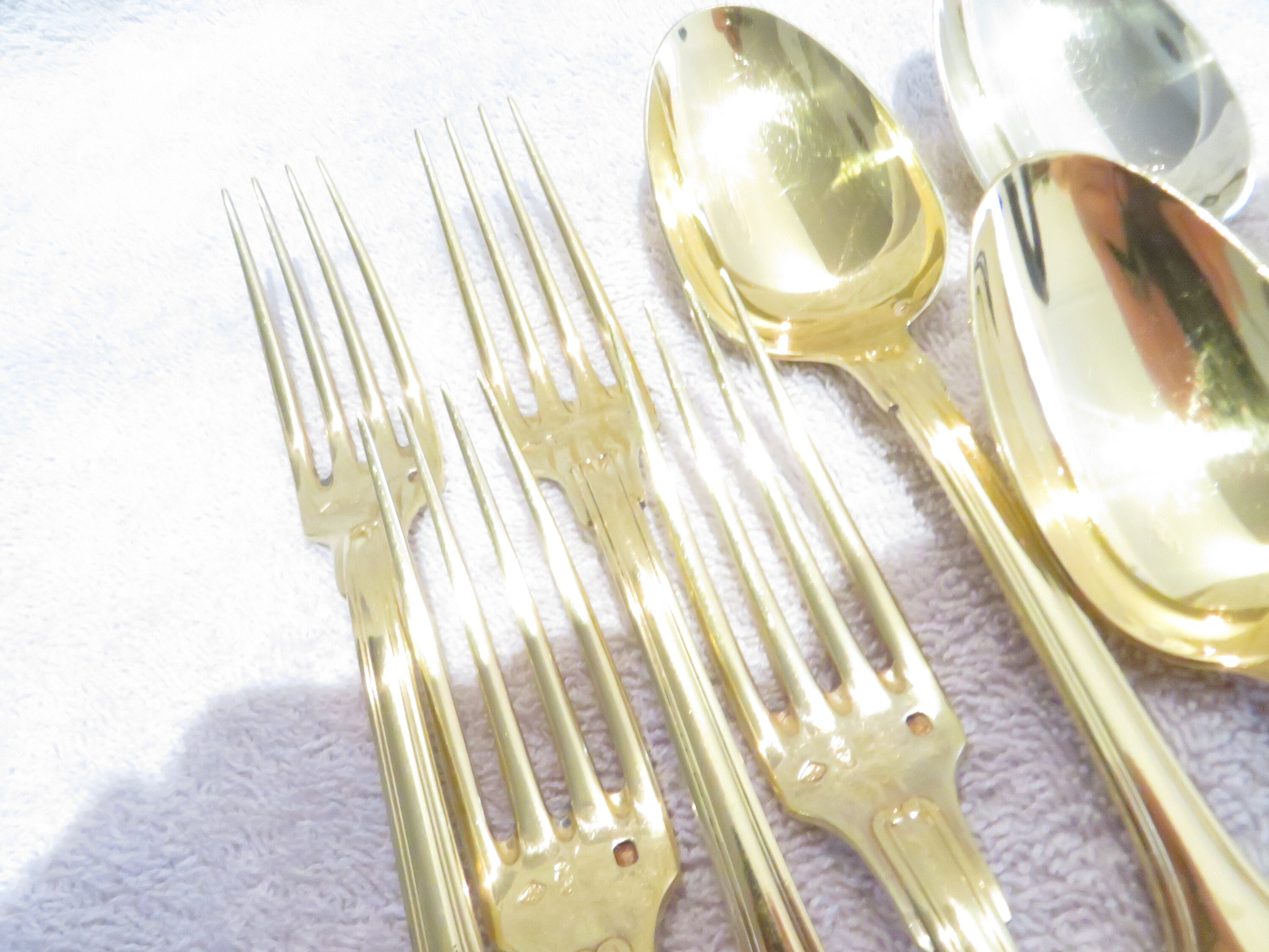 4 Silver-gilt Dessert Spoons and 4 Silver-vermeil Forks (950 Hallmark ...
